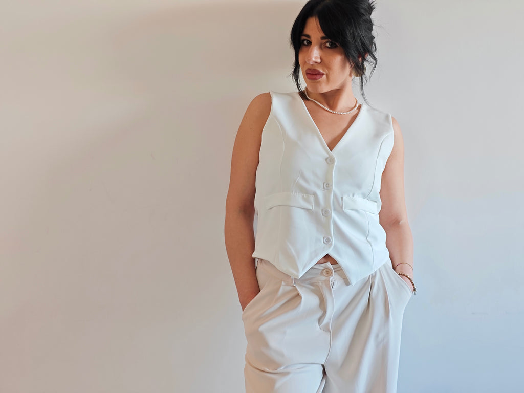 GILET BIANCO CON SCOLLO A V