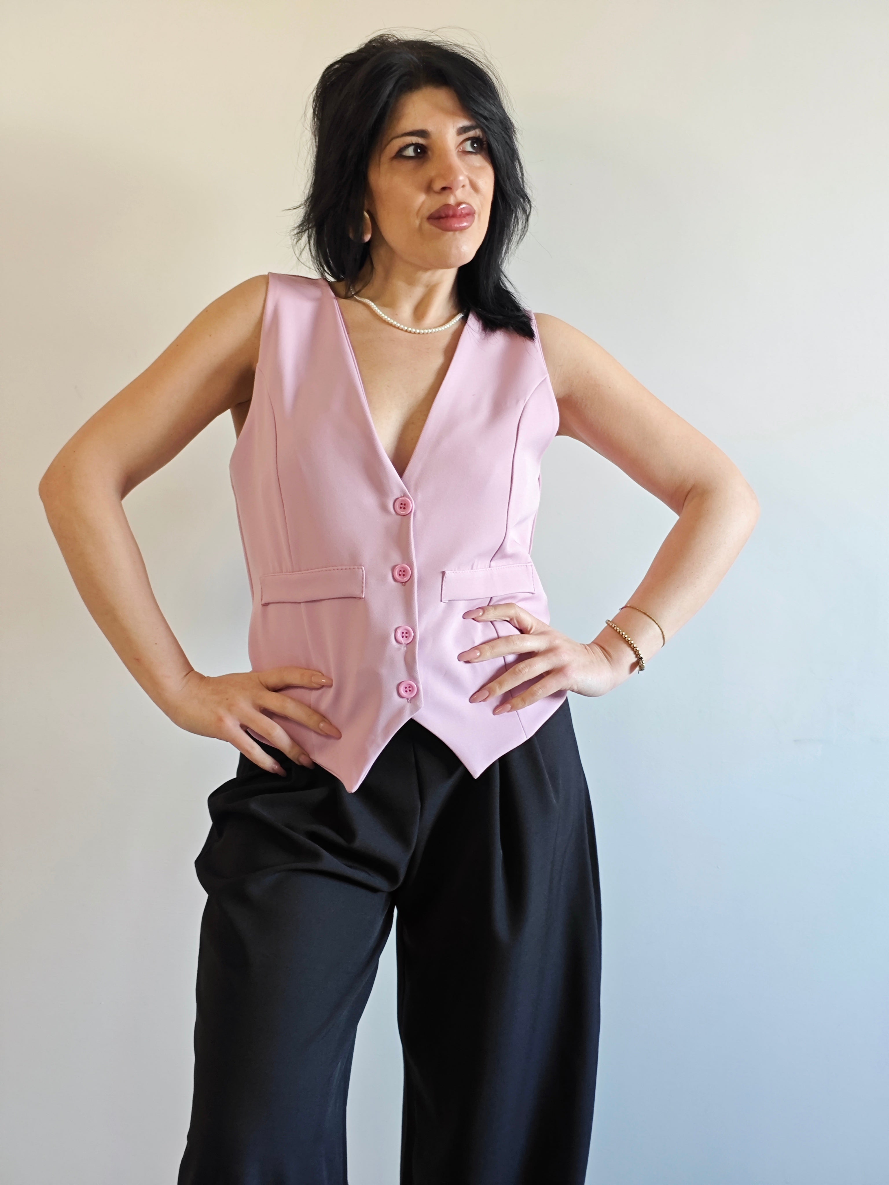 GILET ROSA CON SCOLLO A V