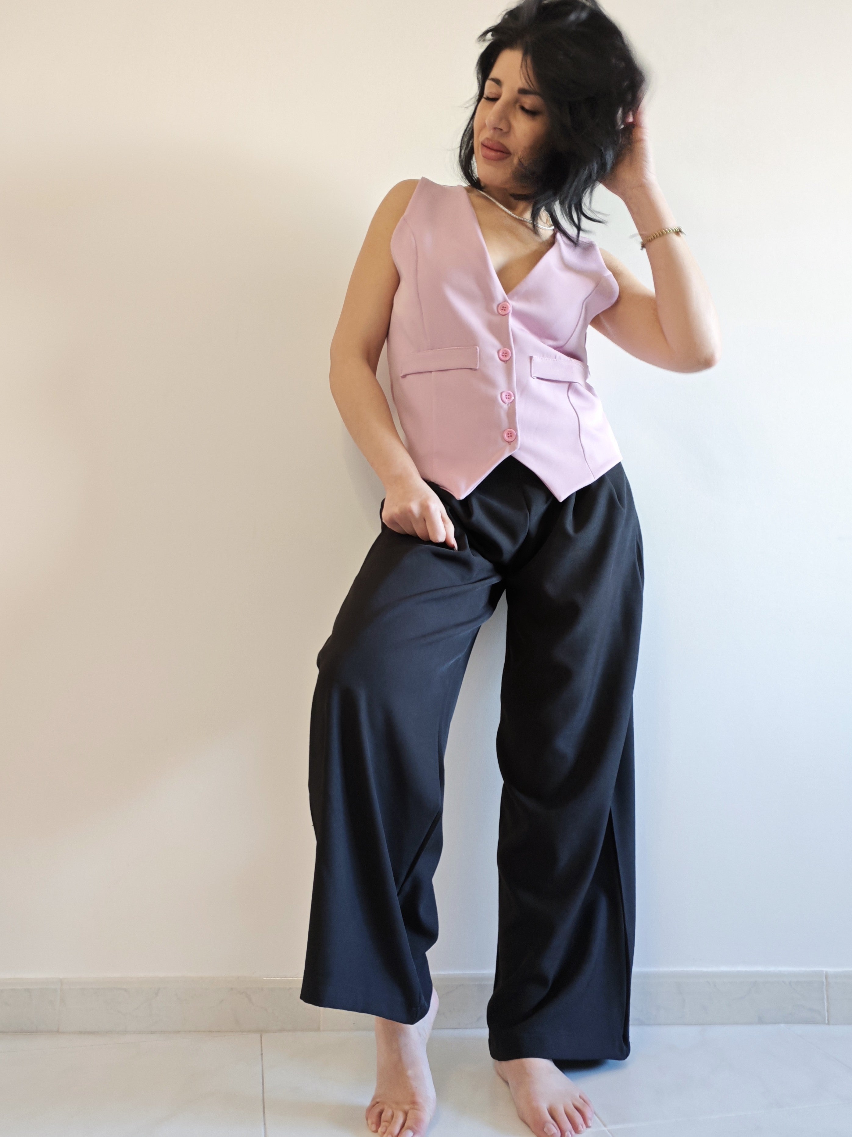 GILET ROSA CON SCOLLO A V