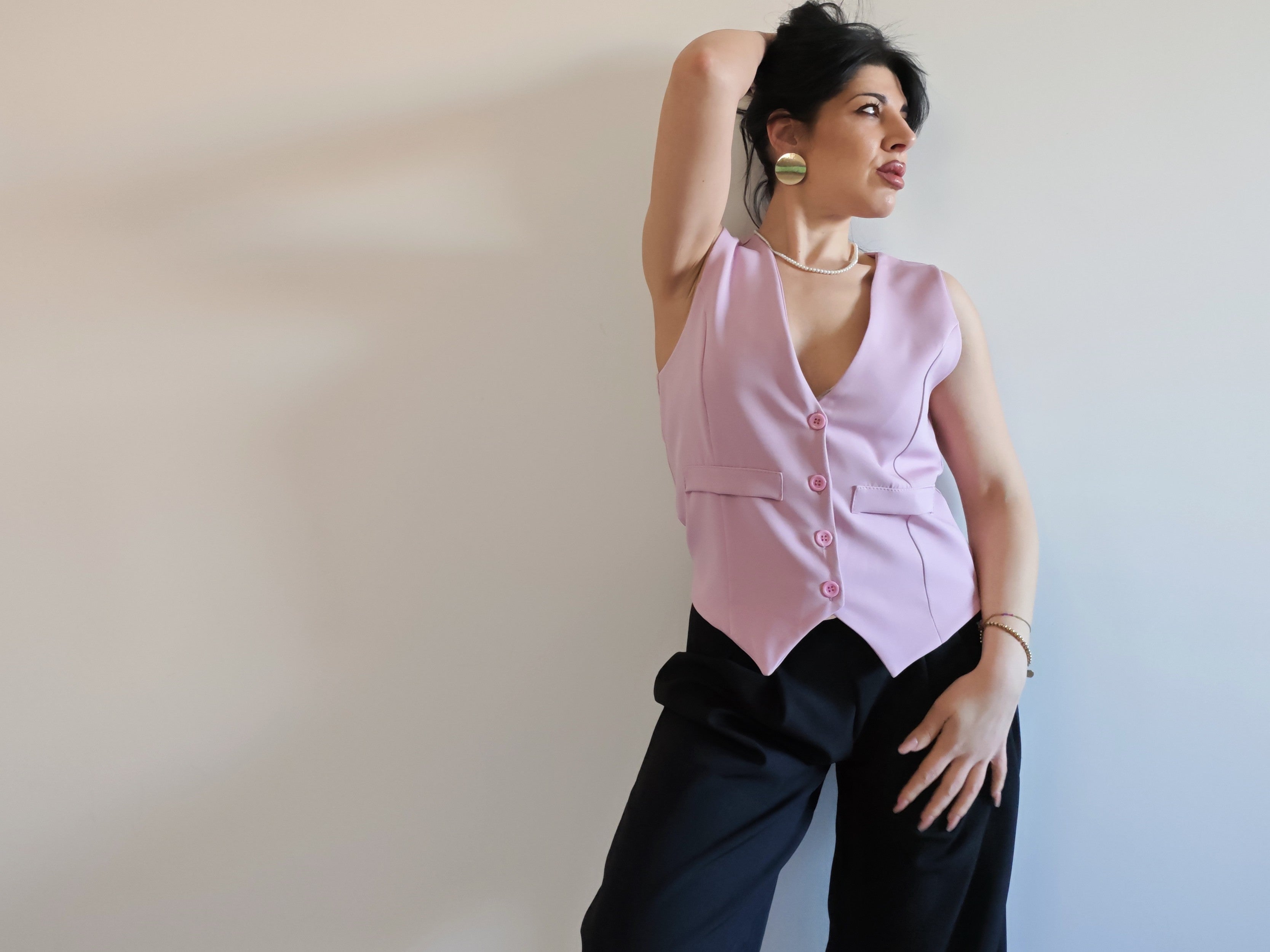 GILET ROSA CON SCOLLO A V