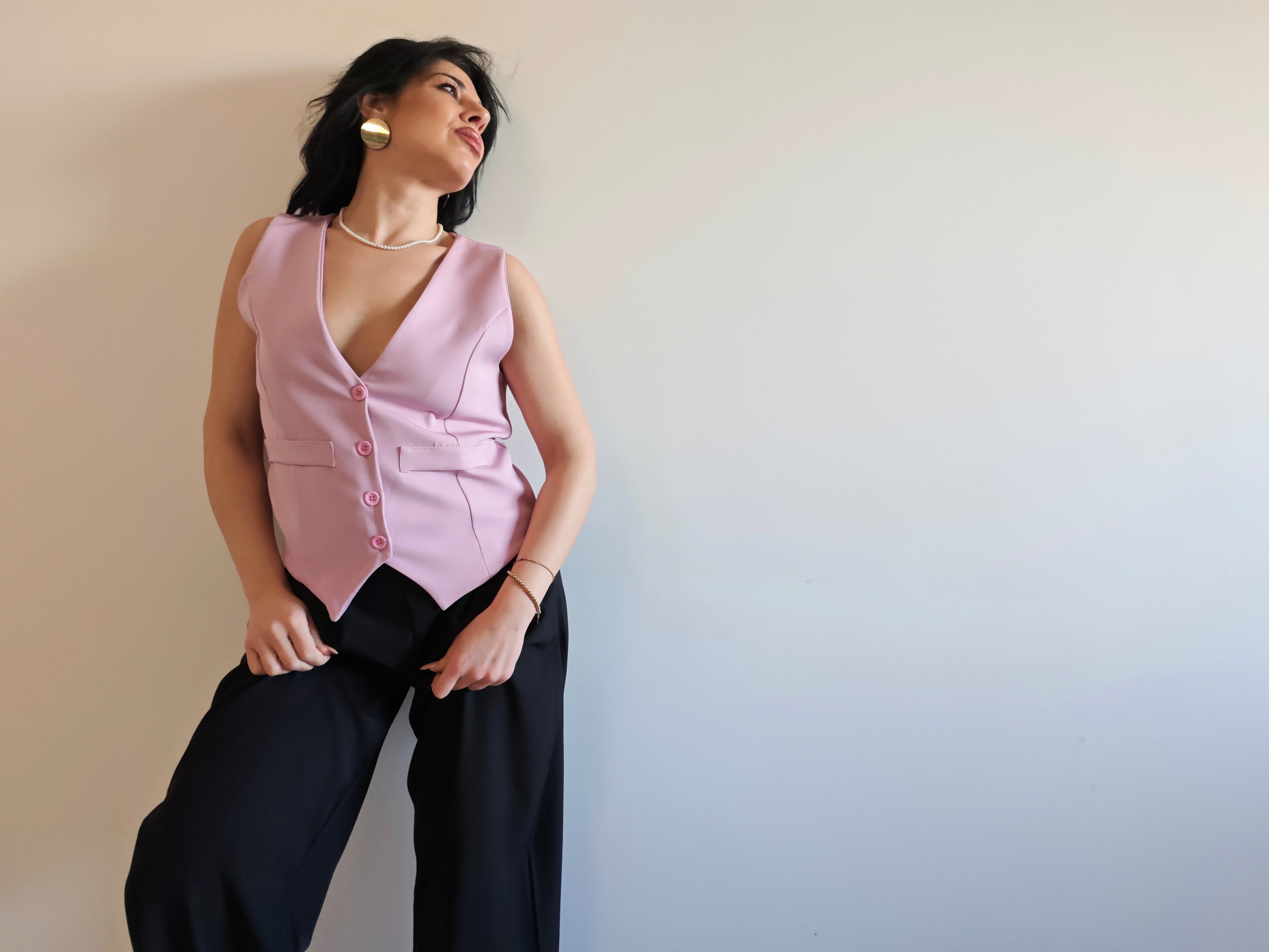 GILET ROSA CON SCOLLO A V