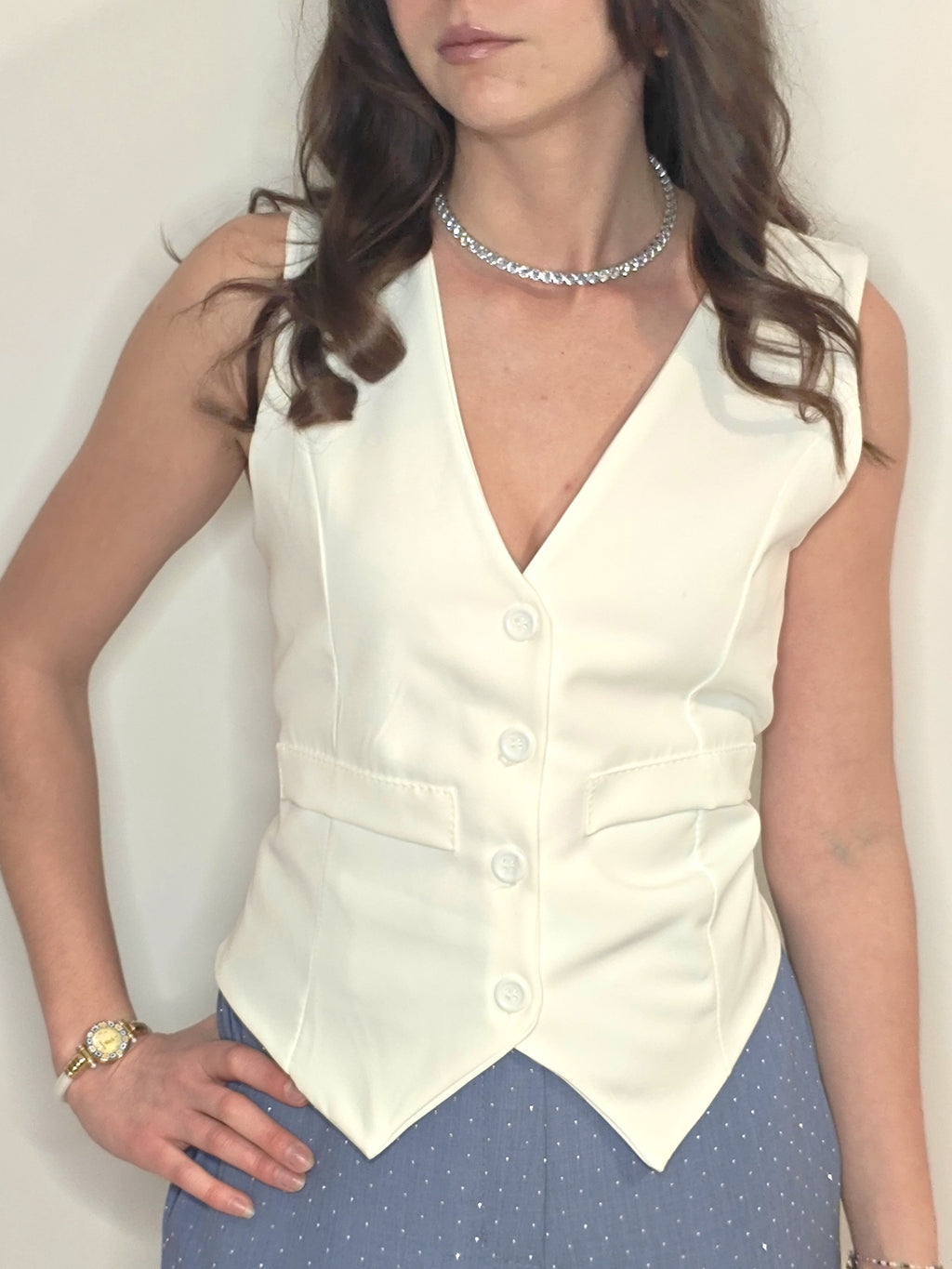 GILET BIANCO CON SCOLLO A V